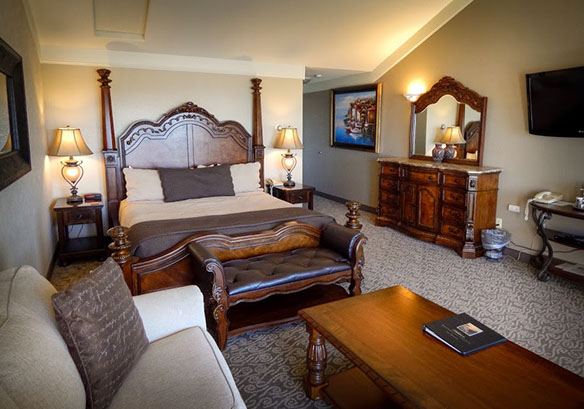 This beautiful room includes a Ca King bed, love sofa, coffee table and all the comforts of home.